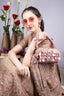 Emerald green handcrafted statement bag with mirror cutdana and sequin embellishments for wedding and festive wear
