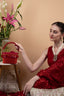 Red crystal potli bag with drawstring tassels for wedding and party wear