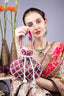 Rani pink suede potli bag with intricate beadwork drawstring closure lightweight festive wedding ethnic accessory