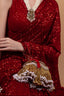 Red velvet potli bag with cutdana pearl and stone embellishments with drawstring and handle for wedding and festive wear