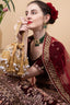 Gold velvet potli bag with cutdana pearl and stone embellishments with drawstring and handle for wedding and festive wear