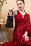Black embellished handcrafted bag with pearl, bead and sequin work with fringe detailing for wedding and party wear