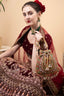 Gold green handcrafted potli bag with beads, stone and pearl work for wedding and festive wear
