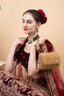 Gold handcrafted clutch with cutdana and crystal embellishments, velvet lining and handle for wedding and party wear