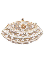 Ivory oval clutch bag with pearl crystal and cutdana embellishment raw silk lining and detachable chain for wedding and festive wear