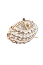 Ivory oval clutch bag with pearl crystal and cutdana embellishment raw silk lining and detachable chain for wedding and festive wear