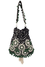 Black handcrafted potli bag with sequin cutdana beadwork stones and drawstring closure for festive and wedding wear