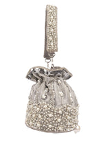 Silver potli bag with cutdana pearl and sequin embellishments on raw silk fabric with tassel for wedding and festive wear