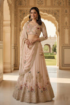 Beige flared faux georgette embroidered lehenga set for wedding and party wear