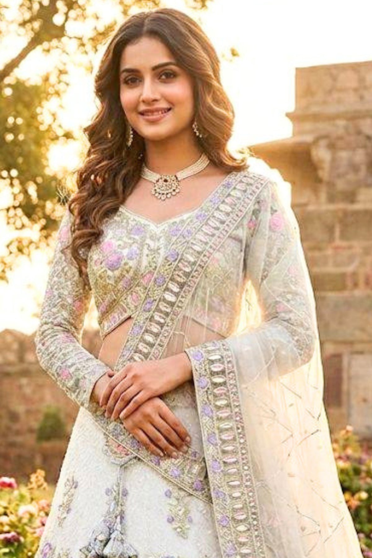 Ivory butterfly net lehenga with coding sequins embroidery for wedding and festive wear
