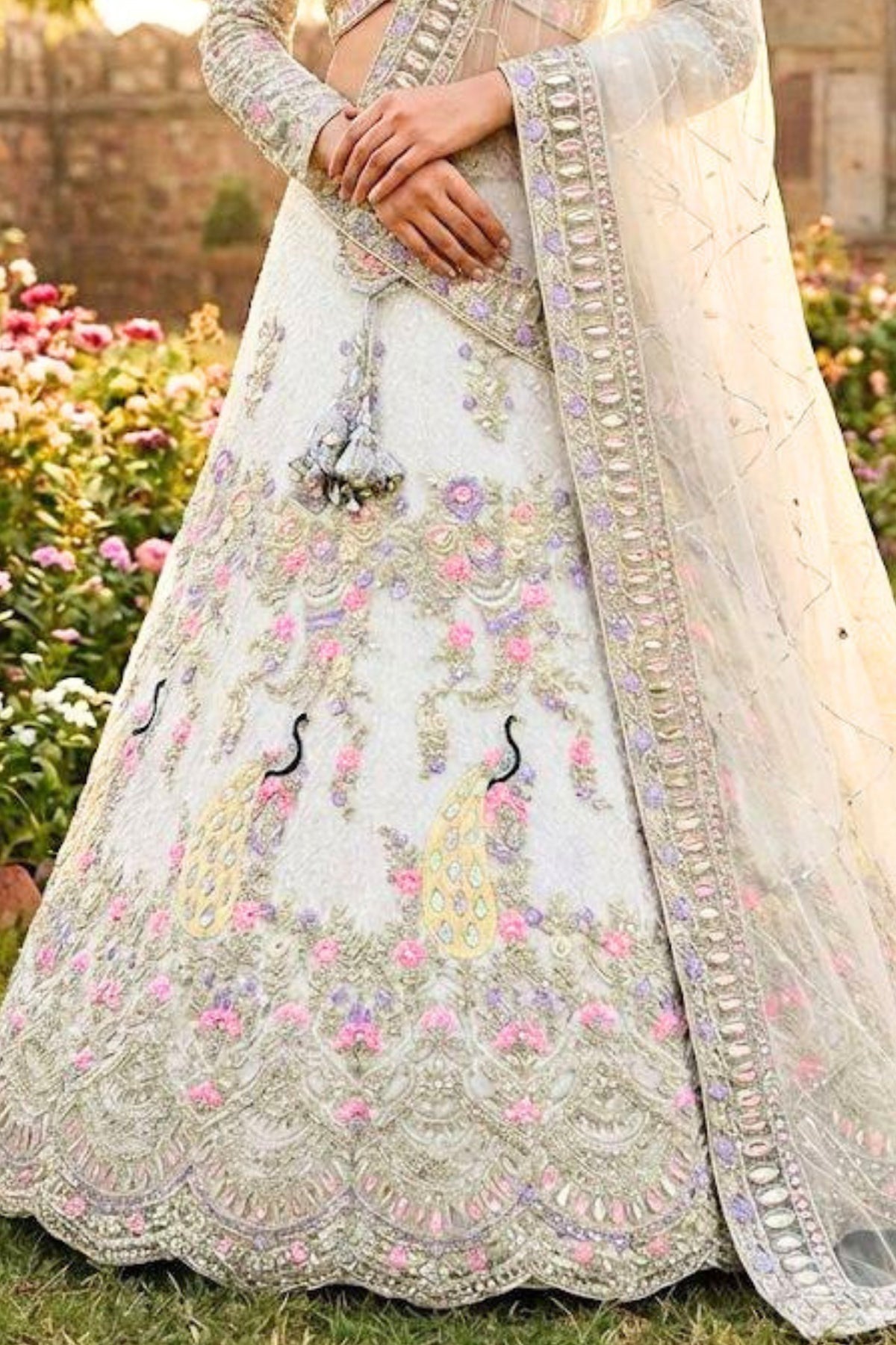 Ivory butterfly net lehenga with coding sequins embroidery for wedding and festive wear