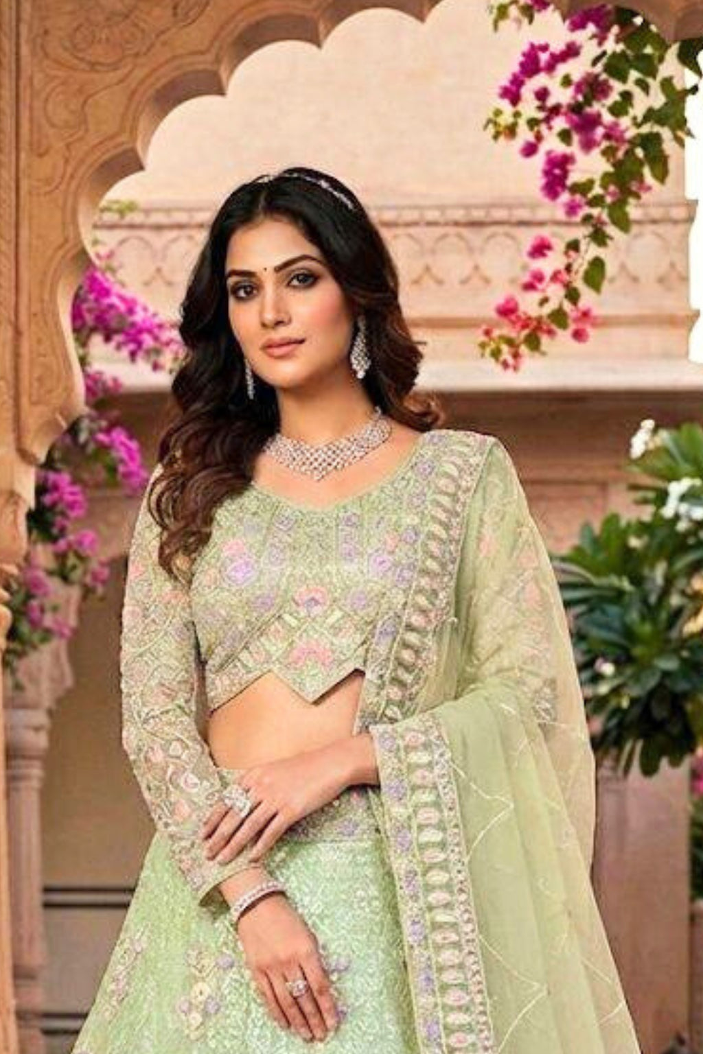 Mint green butterfly net lehenga with coding sequins embroidery for wedding and festive wear
