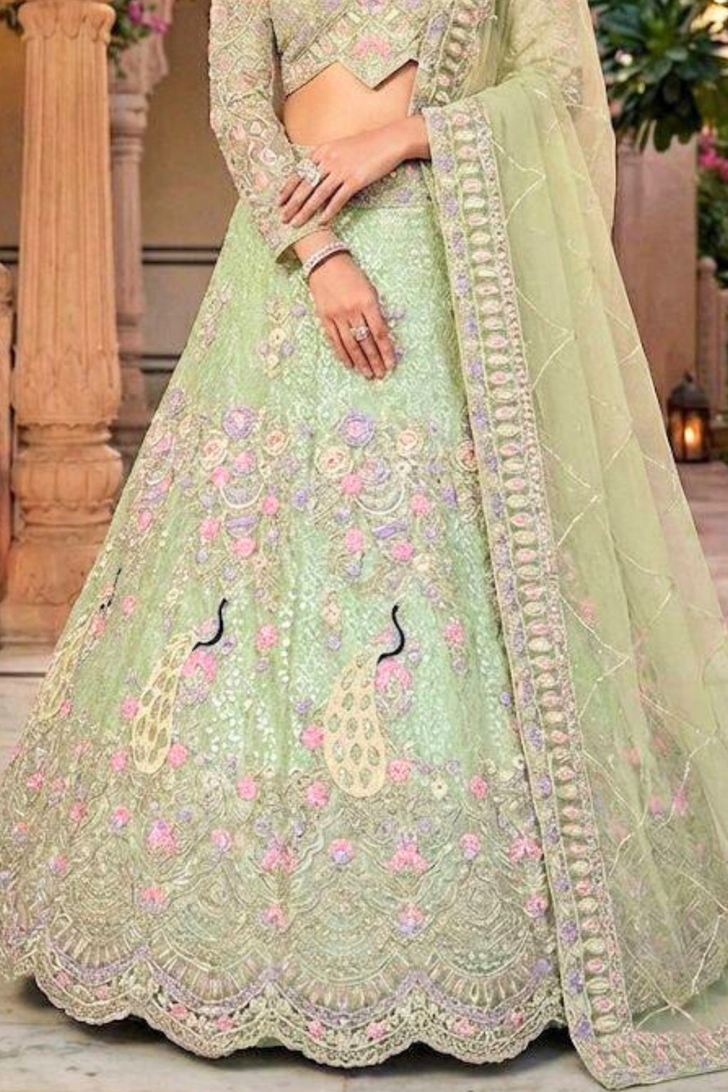 Mint green butterfly net lehenga with coding sequins embroidery for wedding and festive wear
