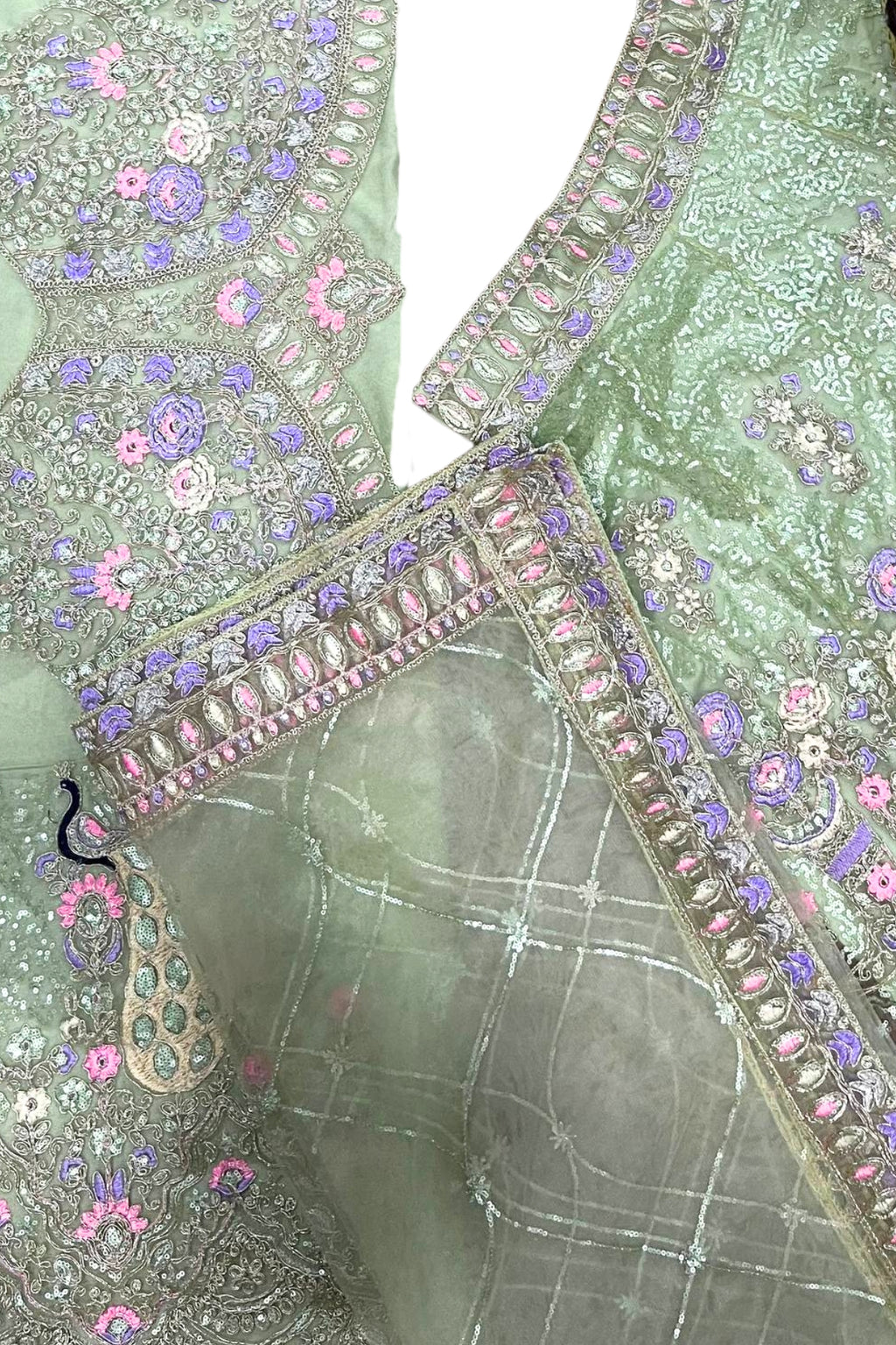 Mint green butterfly net lehenga with coding sequins embroidery for wedding and festive wear