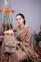 Gold handcrafted evening handbag with stone pearl bead embellishment fringe detail top handle and detachable chain wedding festive wear