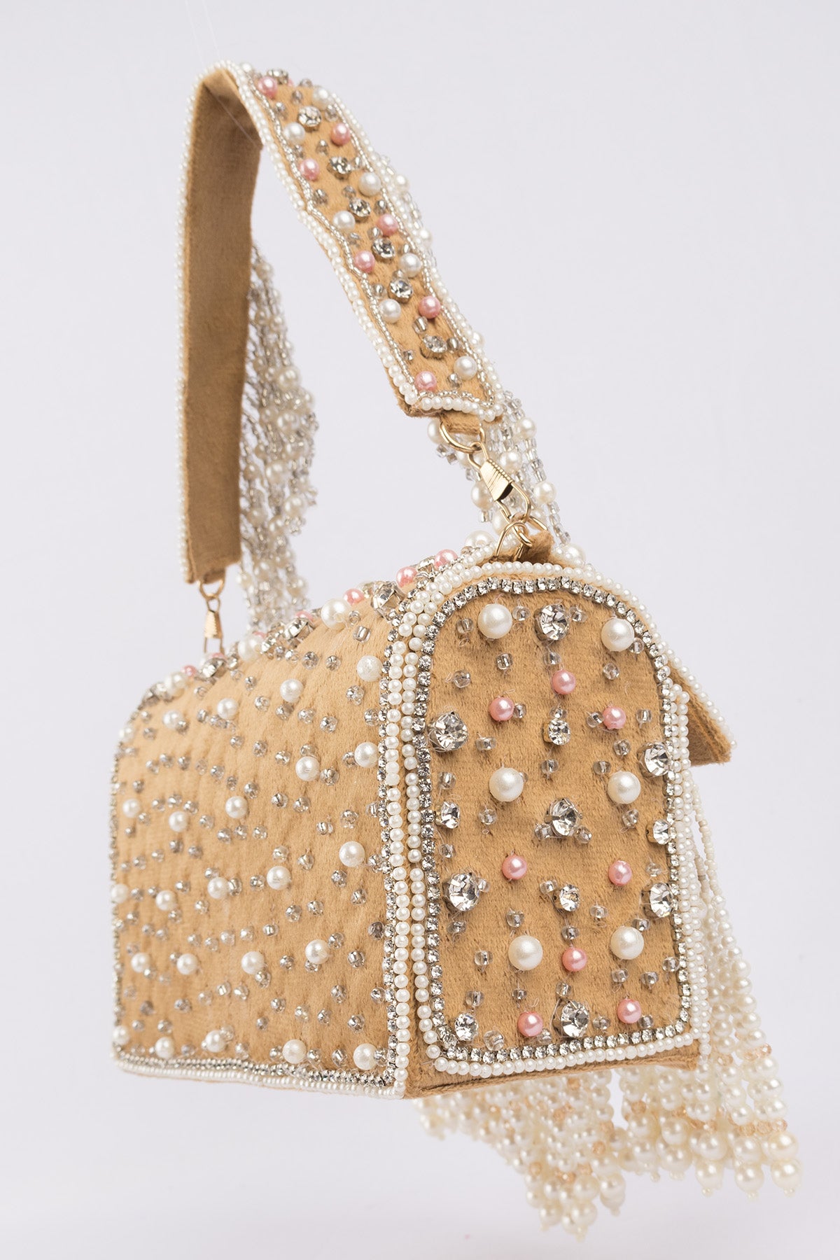 Gold handcrafted evening handbag with stone pearl bead embellishment fringe detail top handle and detachable chain wedding festive wear