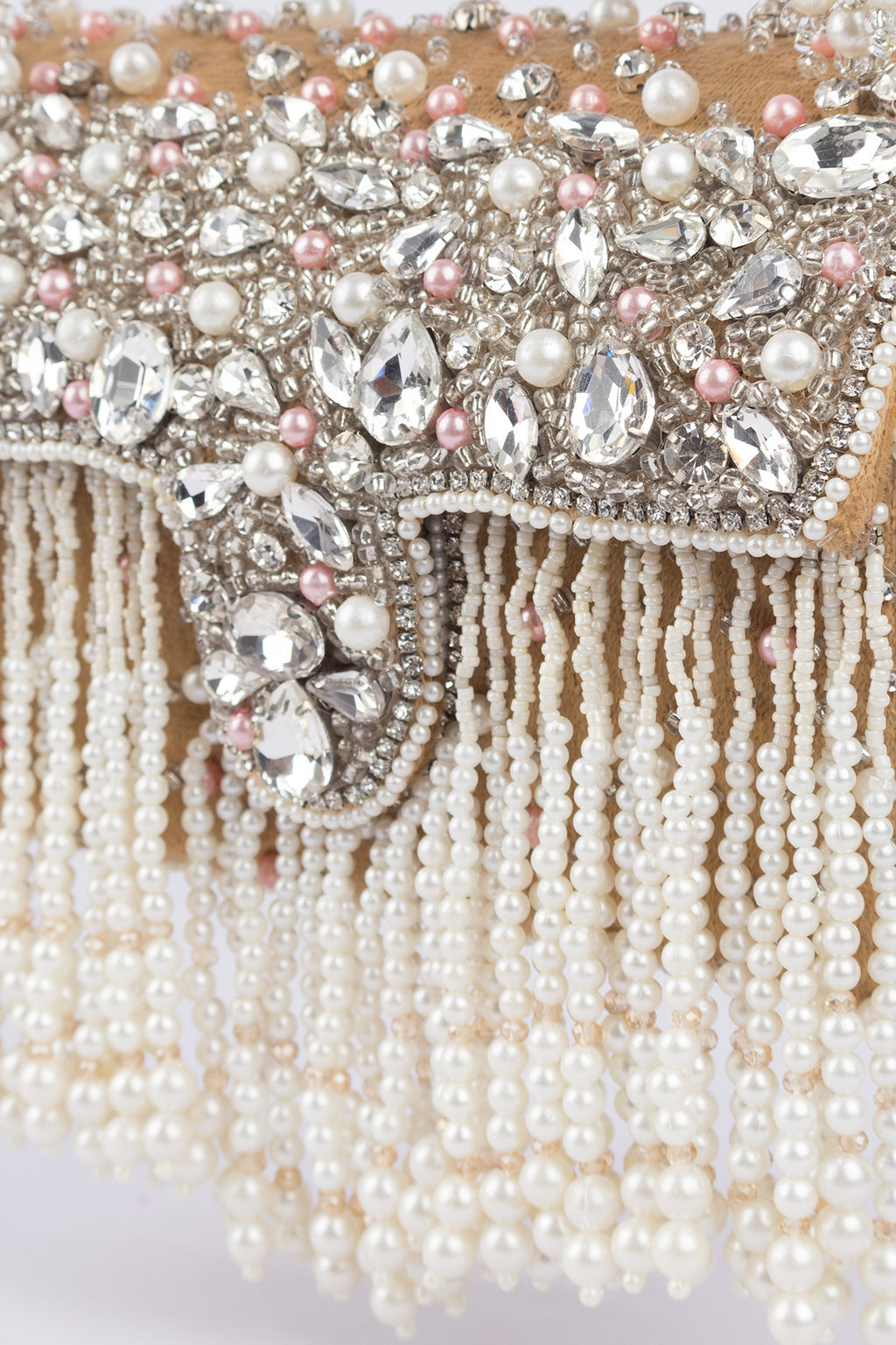 Gold handcrafted evening handbag with stone pearl bead embellishment fringe detail top handle and detachable chain wedding festive wear