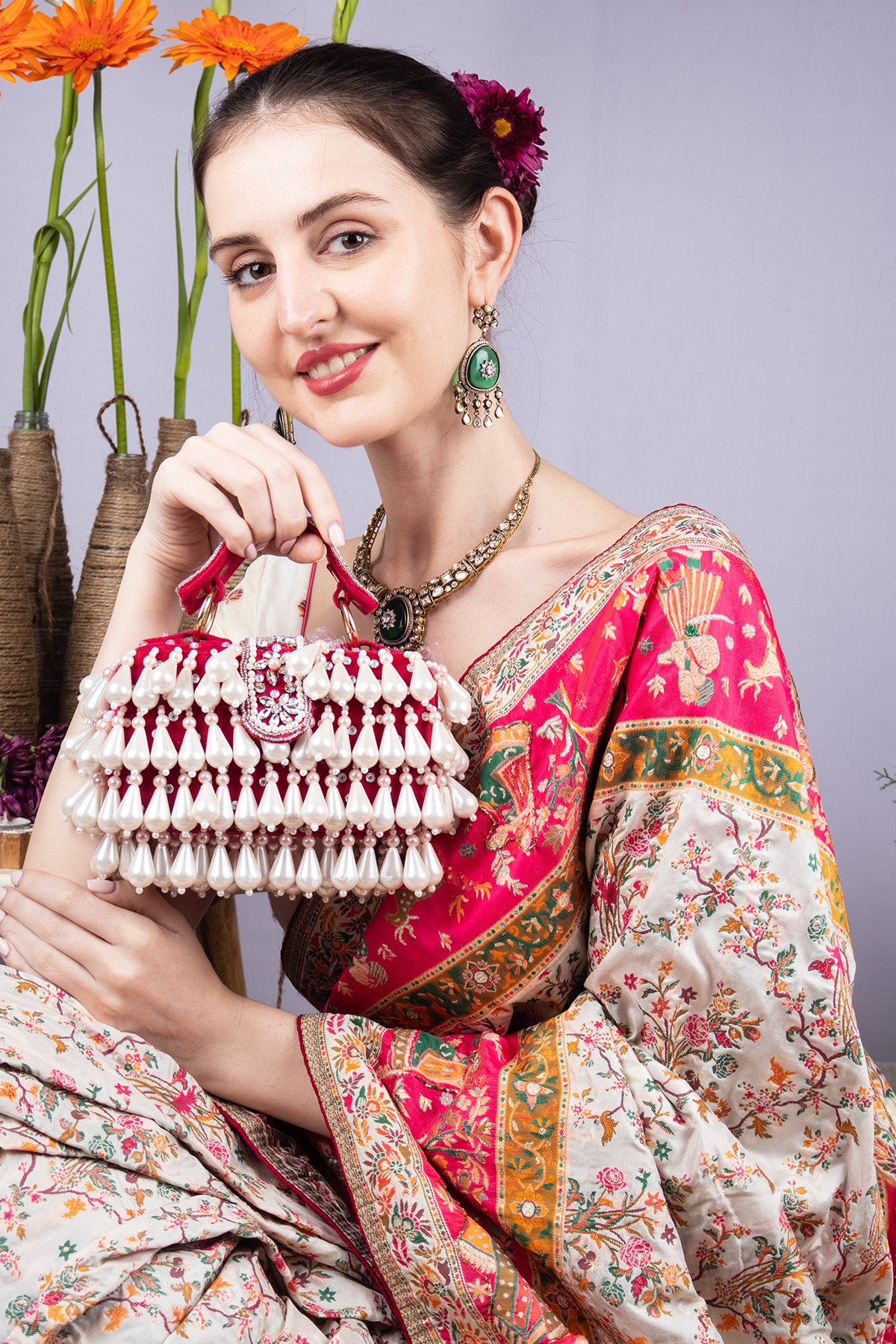 Pearl handcrafted clutch bag with traditional detailing short handle and detachable shoulder chain for wedding and festive wear