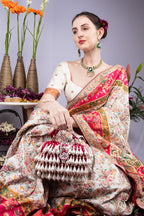 Pearl handcrafted clutch bag with traditional detailing short handle and detachable shoulder chain for wedding and festive wear