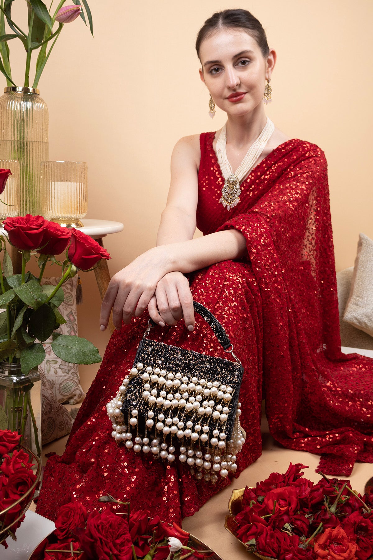 Black hand-embellished clutch bag with diamond pearl bead and sequin work with chain strap for party and wedding wear