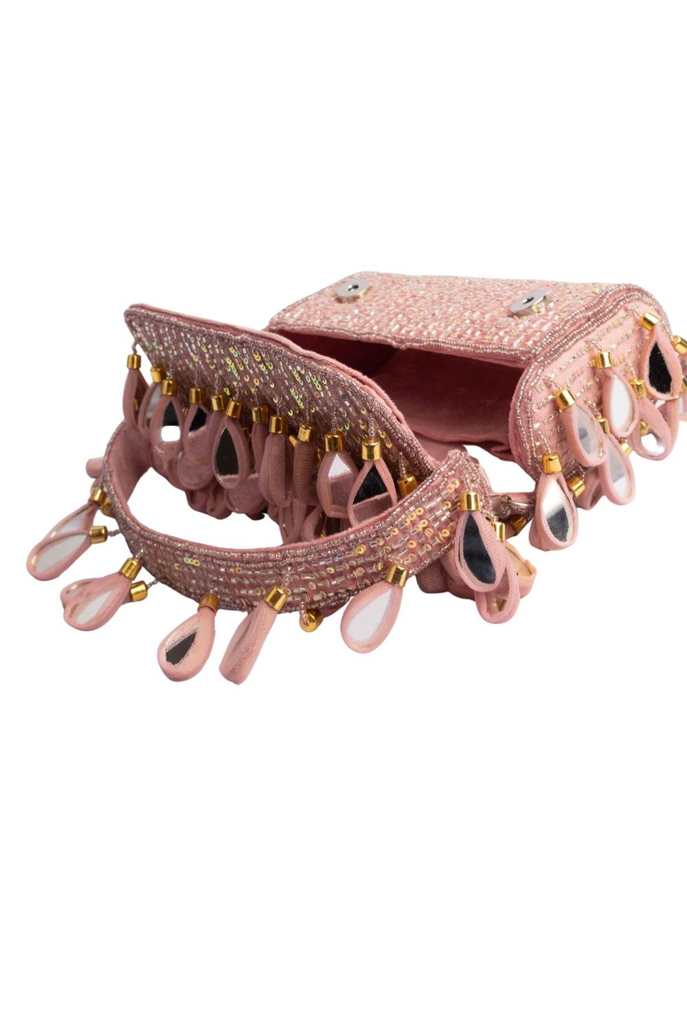 Emerald green handcrafted statement bag with mirror cutdana and sequin embellishments for wedding and festive wear