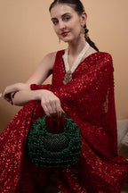 Emerald green pearl and bead embellished ethnic handle bag for wedding and festive wear