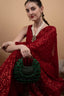 Emerald green pearl and bead embellished ethnic handle bag for wedding and festive wear