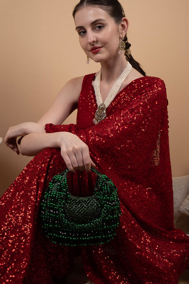 Emerald green pearl and bead embellished ethnic handle bag for wedding and festive wear Hover Image
