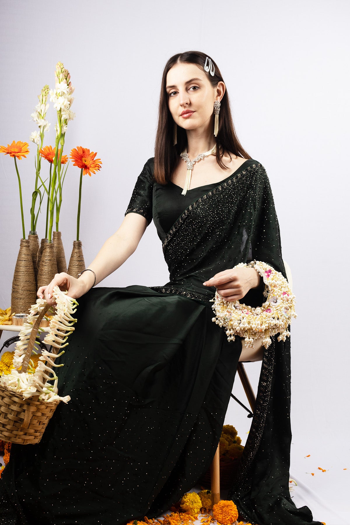 Ivory pearl cluster handle bag with floral embellishment handcrafted ethnic clutch for wedding and festive wear