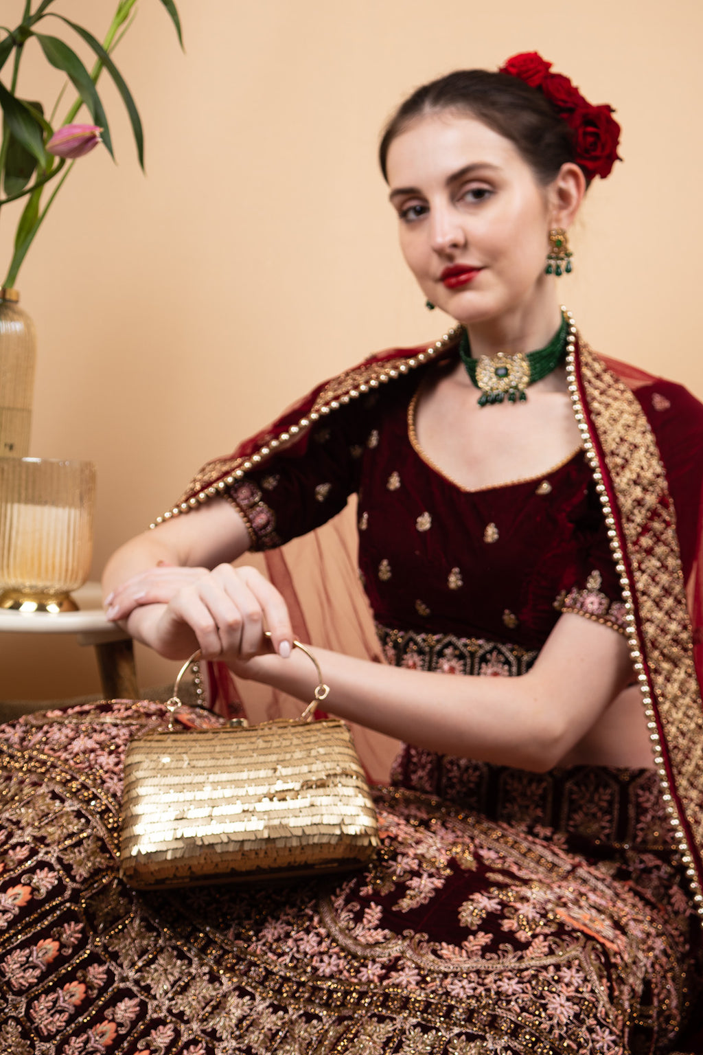 Gold sequin embellished handbag with metal handle raw silk lining and button closure for wedding and festive party wear