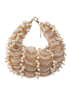 Champagne gold pearl and crystal embellished ethnic clutch handle bag for wedding and bridal wear