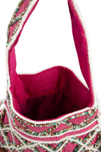 Rani pink suede potli bag with intricate beadwork drawstring closure lightweight festive wedding ethnic accessory