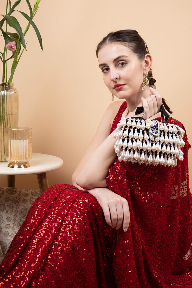Pearl handcrafted clutch bag with traditional detailing short handle and detachable shoulder chain for wedding and festive wear Hover Image