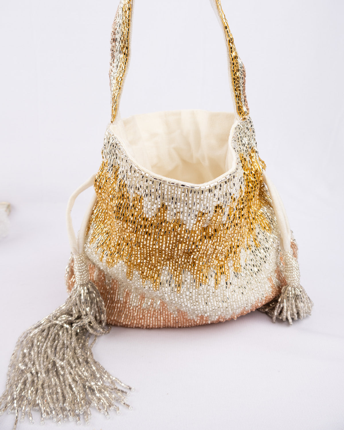 Cut dana work potli bag with gold silver rose shimmer velvet drawstring closure festive wedding ethnic accessory