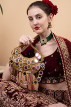 Gold beaded mirror work handle bag with pink accents and mirror embellishments for wedding and festive wear
