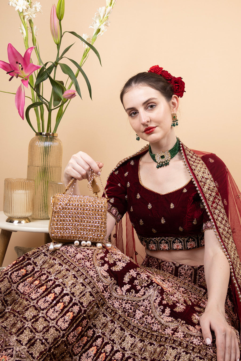 Gold crystal embellished evening handbag with structured design handle and chain strap for wedding and party wear
