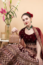Gold crystal embellished evening handbag with structured design handle and chain strap for wedding and party wear