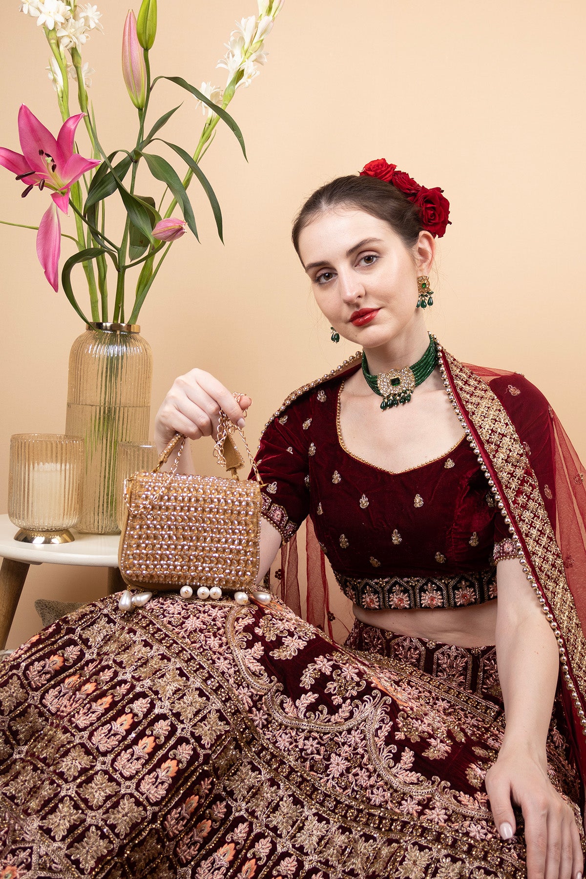 Gold crystal embellished evening handbag with structured design handle and chain strap for wedding and party wear