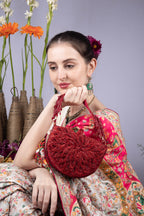 Red cut dana suede semi-circular clutch bag for wedding and party wear