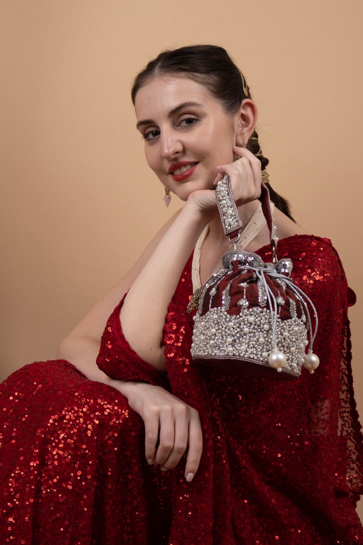 Maroon Raw Silk Cutdana & Pearl Embellished Potli Bag