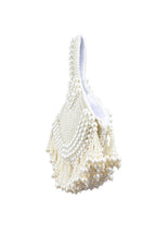 Ivory pearl beaded clutch bag with fringe detailing and velvet lining for wedding and festive wear
