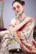 Blue and olive raw silk potli bag with sequins cutdana and pearl embellishments with tassel for wedding and festive wear