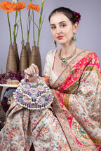 Purple handcrafted potli bag with beads sequins zari embroidery and pearl detailing with chain strap for wedding and festive wear