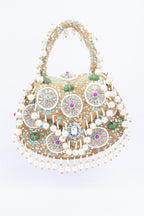 Beige handcrafted potli bag with beads sequins zari embroidery and pearl detailing with chain strap for wedding and festive wear