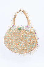 Beige handcrafted potli bag with beads sequins zari embroidery and pearl detailing with chain strap for wedding and festive wear