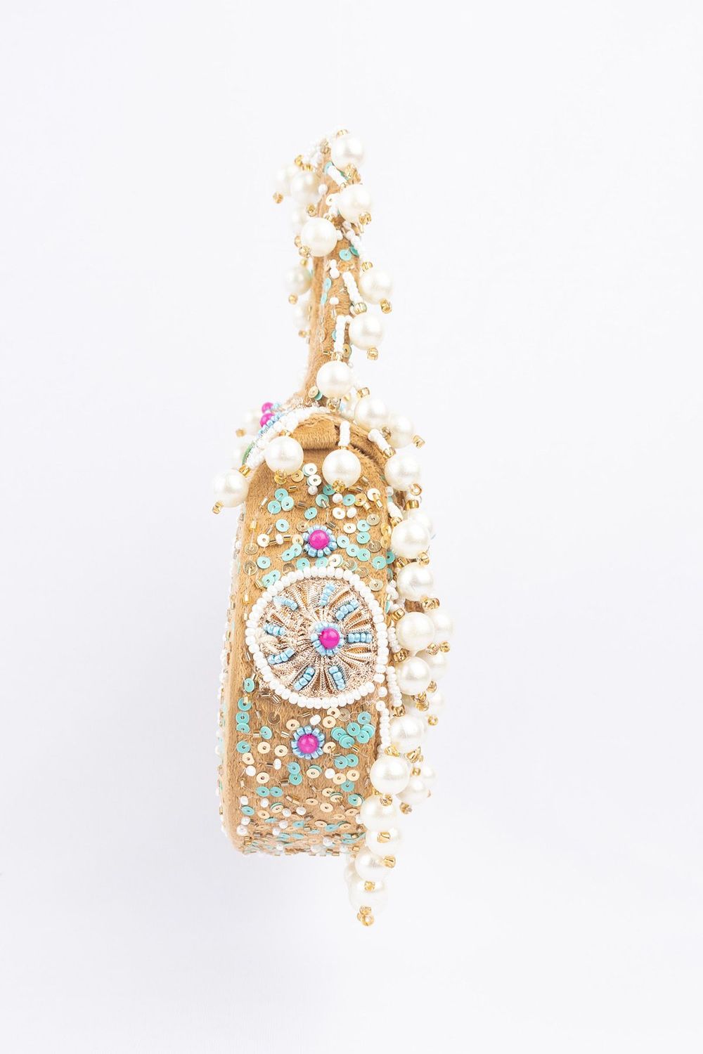 Beige handcrafted potli bag with beads sequins zari embroidery and pearl detailing with chain strap for wedding and festive wear