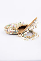 Beige handcrafted potli bag with beads sequins zari embroidery and pearl detailing with chain strap for wedding and festive wear