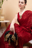 Black beaded floral mirror work clutch bag with handcrafted detailing and suede lining for wedding and festive wear