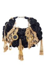 Black beaded floral mirror work clutch bag with handcrafted detailing and suede lining for wedding and festive wear