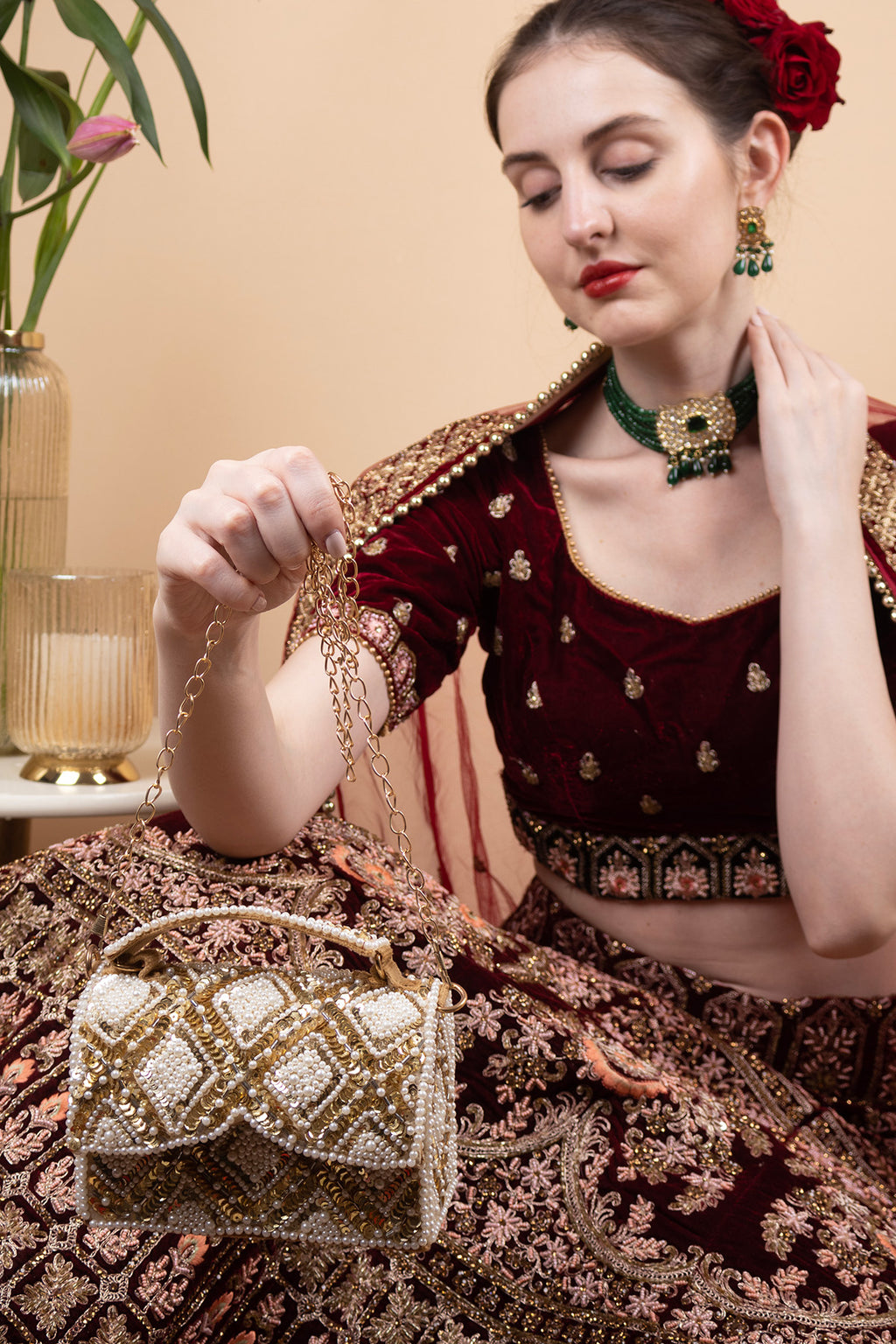 Handcrafted clutch bag with pearl and sequin geometric design structured silhouette short handle and detachable chain for wedding and festive wear